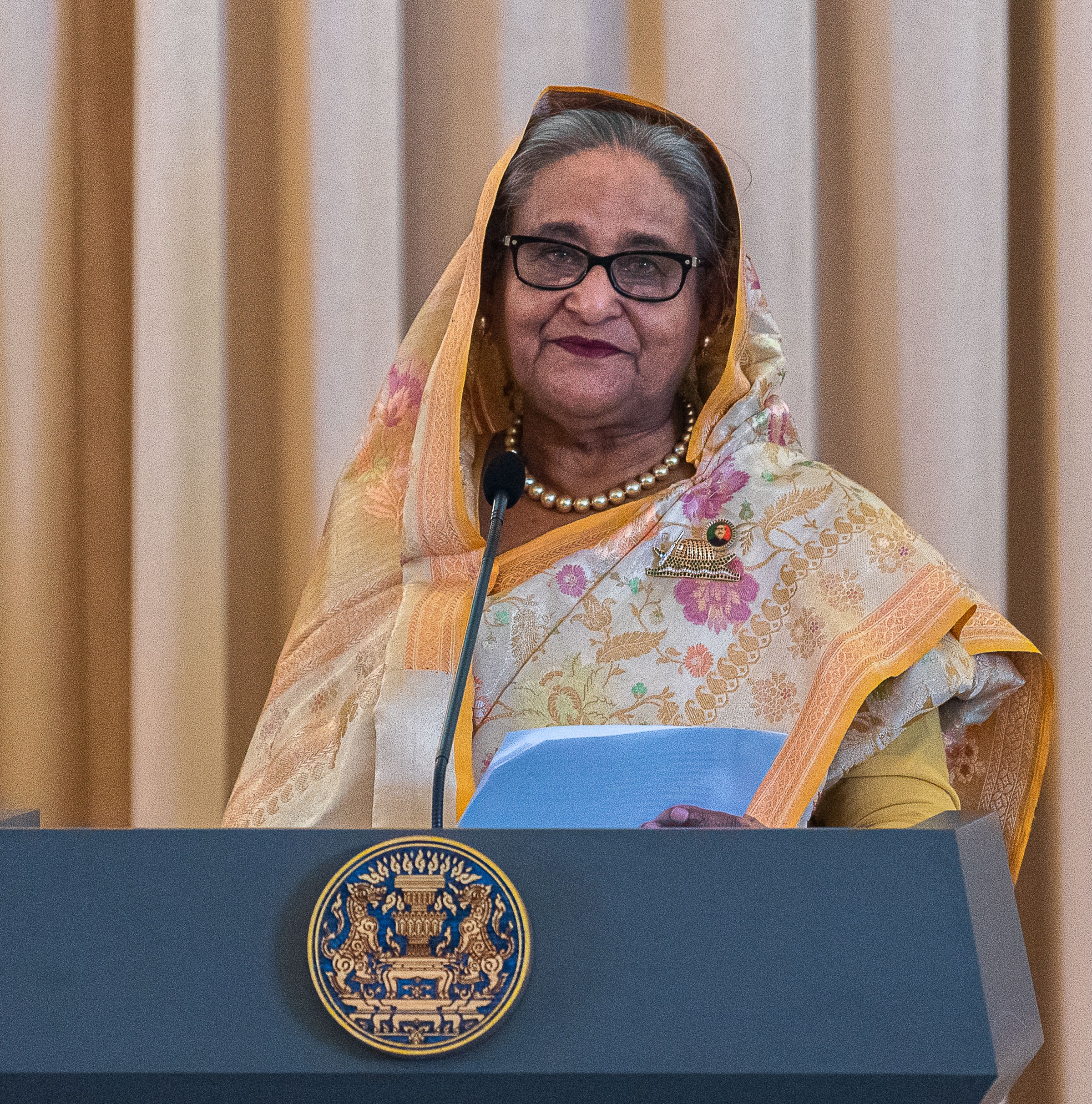 Bangladesh’s prime minister just fled the country in a helicopter. Why?